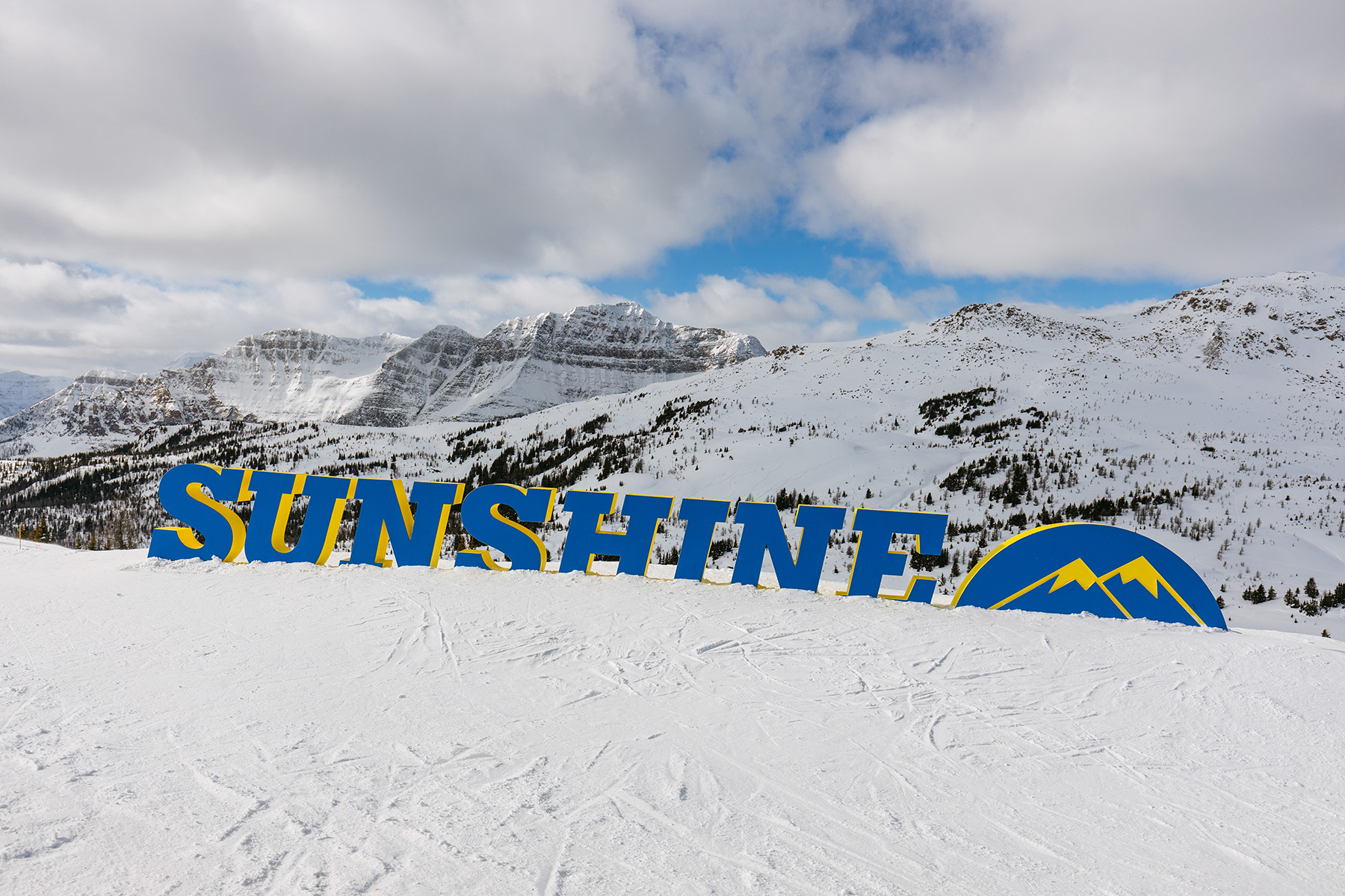 Banff Sunshine sign at top of mountain