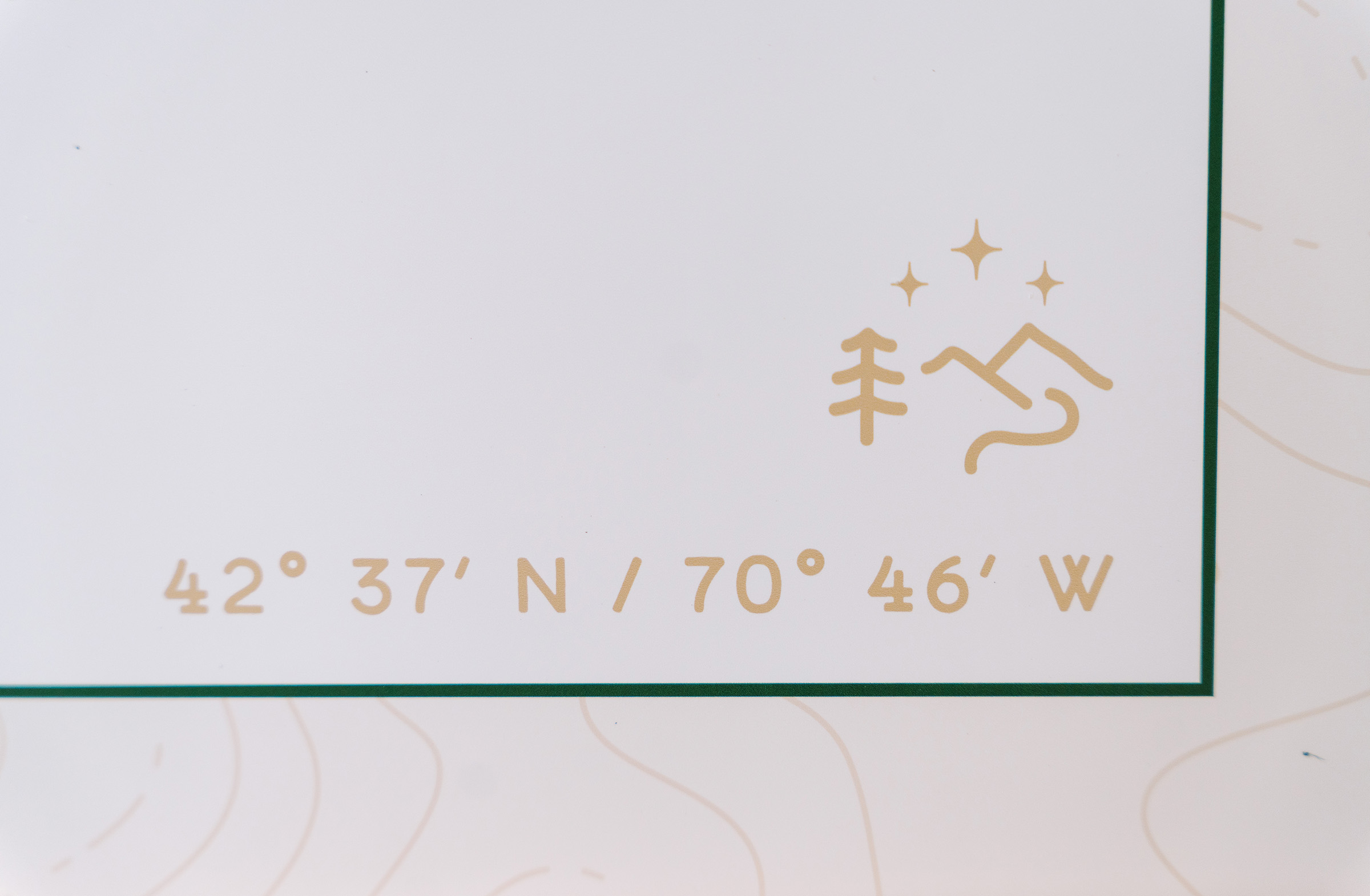 detail shot of iconography and gps coordinates